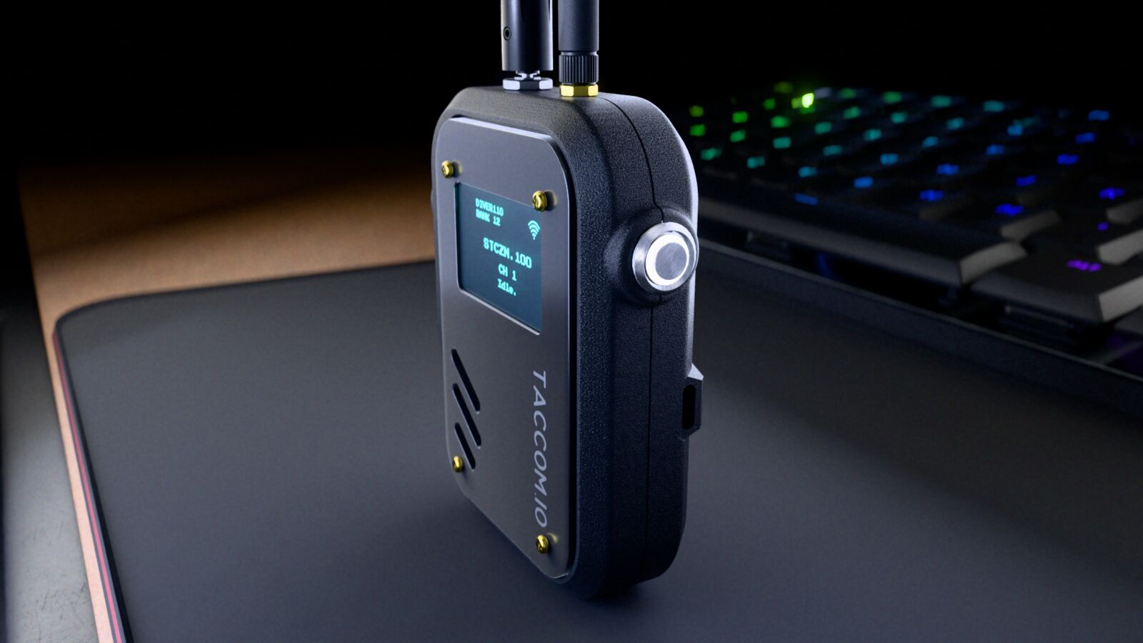 TACCOM v2 radio close up with the channel display lit
